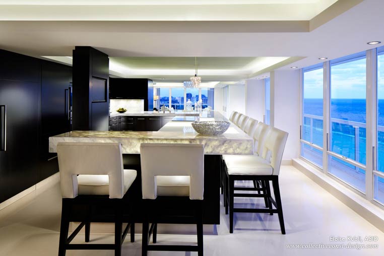 The countertops in this Fort Lauderdale condominium are quartzite and backlit for drama.