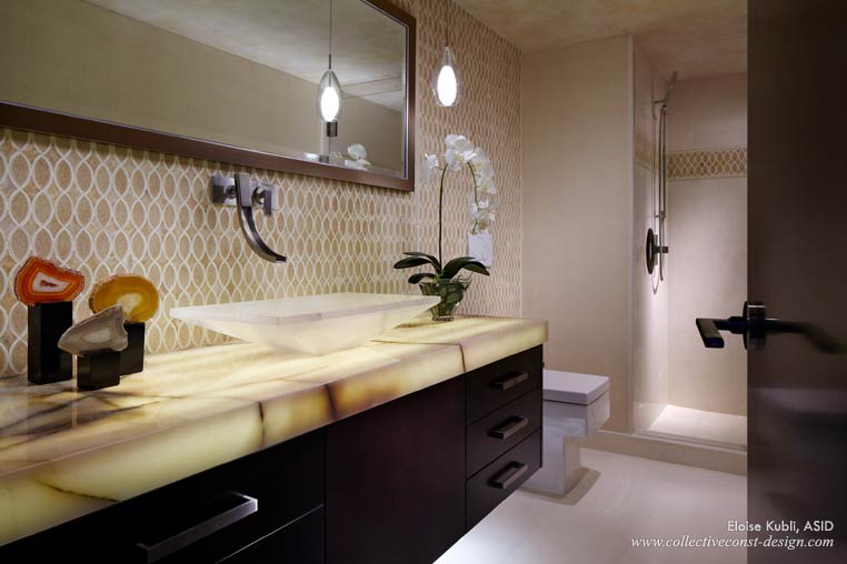 A vessel sink that sits on top of the vanity.