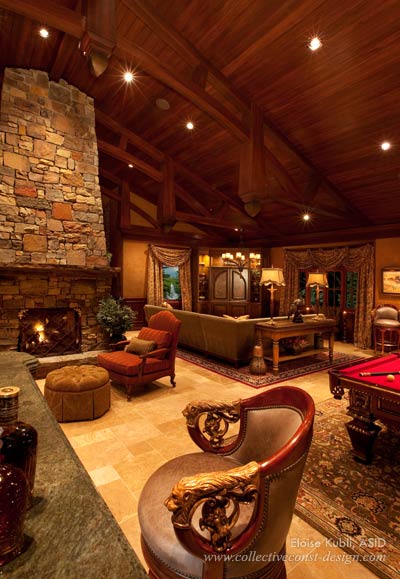 In the game room, a double fieldstone fireplace and Swaim’s Old World billiard table combine with E.G. Cody’s bronze lionhead carved barstools for a metropolitan masculinity.