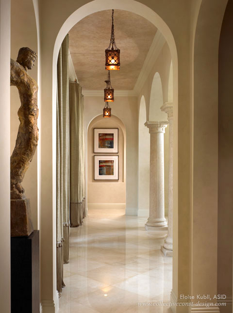 Interior hallway with drapes and statue details.