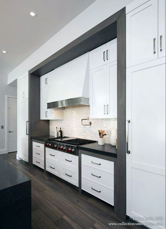 Simple white Shaker-style cabinetry creates a clean, fresh look. Cabinetry: KitchenWorks
