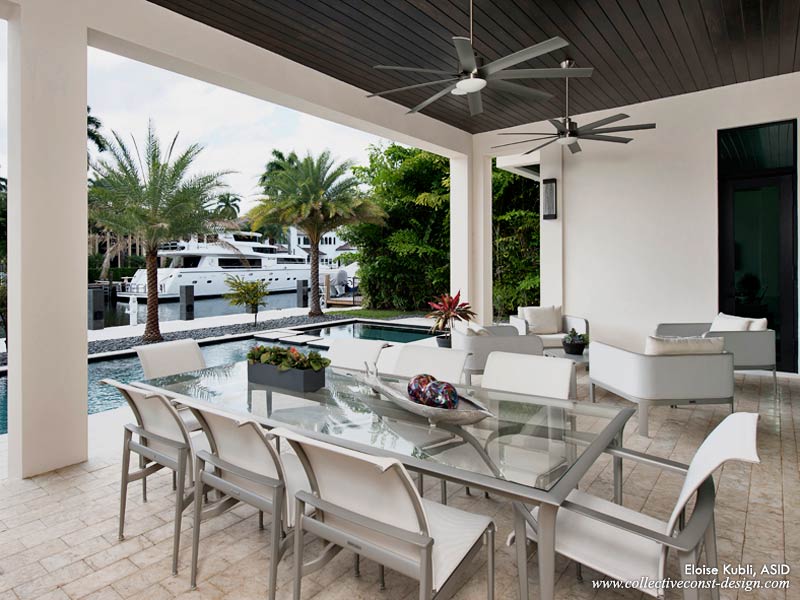 Overlooking the pool and Florida’s Intracoastal Waterway, Kubli designed this spacious and airy patio for enjoyable dining and relaxed conversation. Cabinetry: KitchenWorks