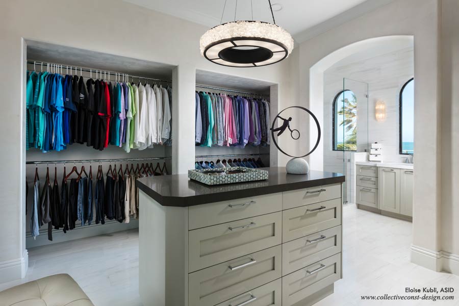 The cabinetry in his bath and closet is cashmere grey hand-glazed with conversion polyurethane. Dolomite marble is specified thorughout.