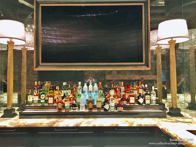 The wet bar in the great room. The liquor bottles are in the “working area” of the bar.